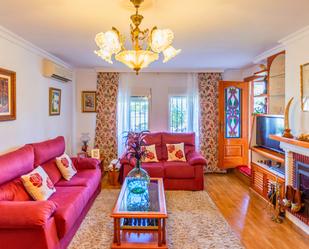 Living room of Single-family semi-detached for sale in Málaga Capital  with Air Conditioner, Heating and Terrace