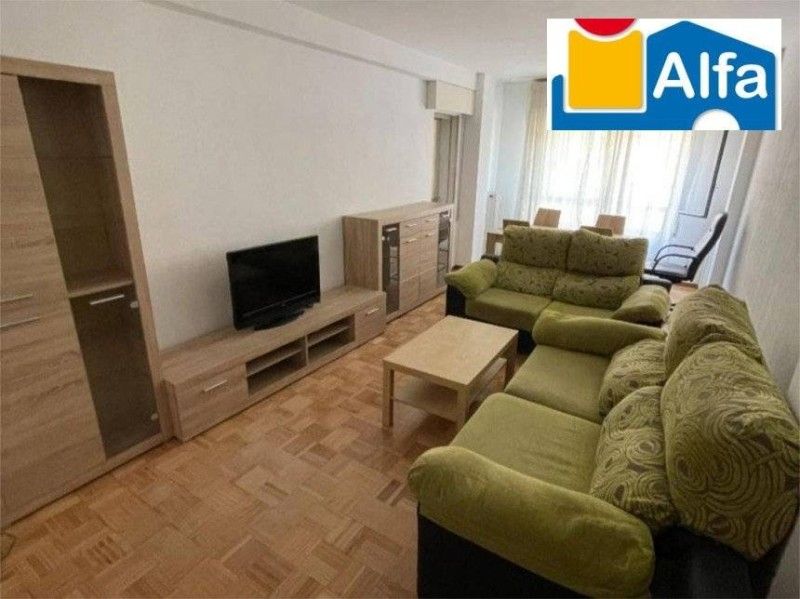 Living room of Flat to rent in Cáceres Capital  with Heating, Private garden and Parquet flooring