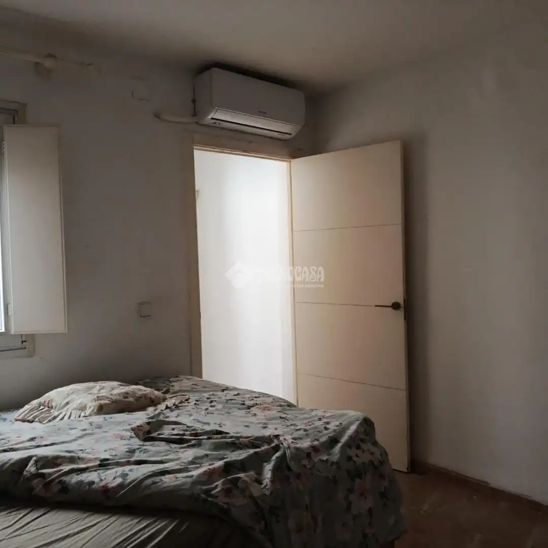 Habitación de Casa adosada en venta en Pilas con Aire acondicionado y Amueblado