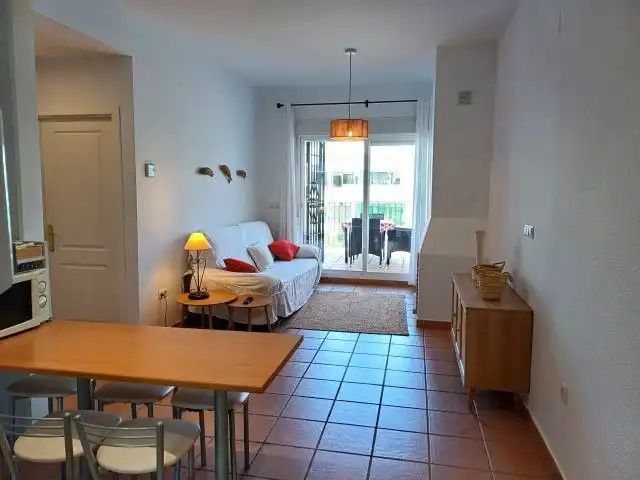 Sala de estar de Apartamento de alquiler en Islantilla con Aire acondicionado, Calefacción y Terraza