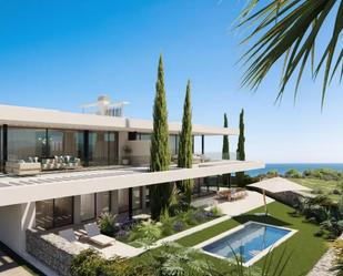 Exterior view of Planta baja for sale in Marbella  with Air Conditioner, Terrace and Swimming Pool
