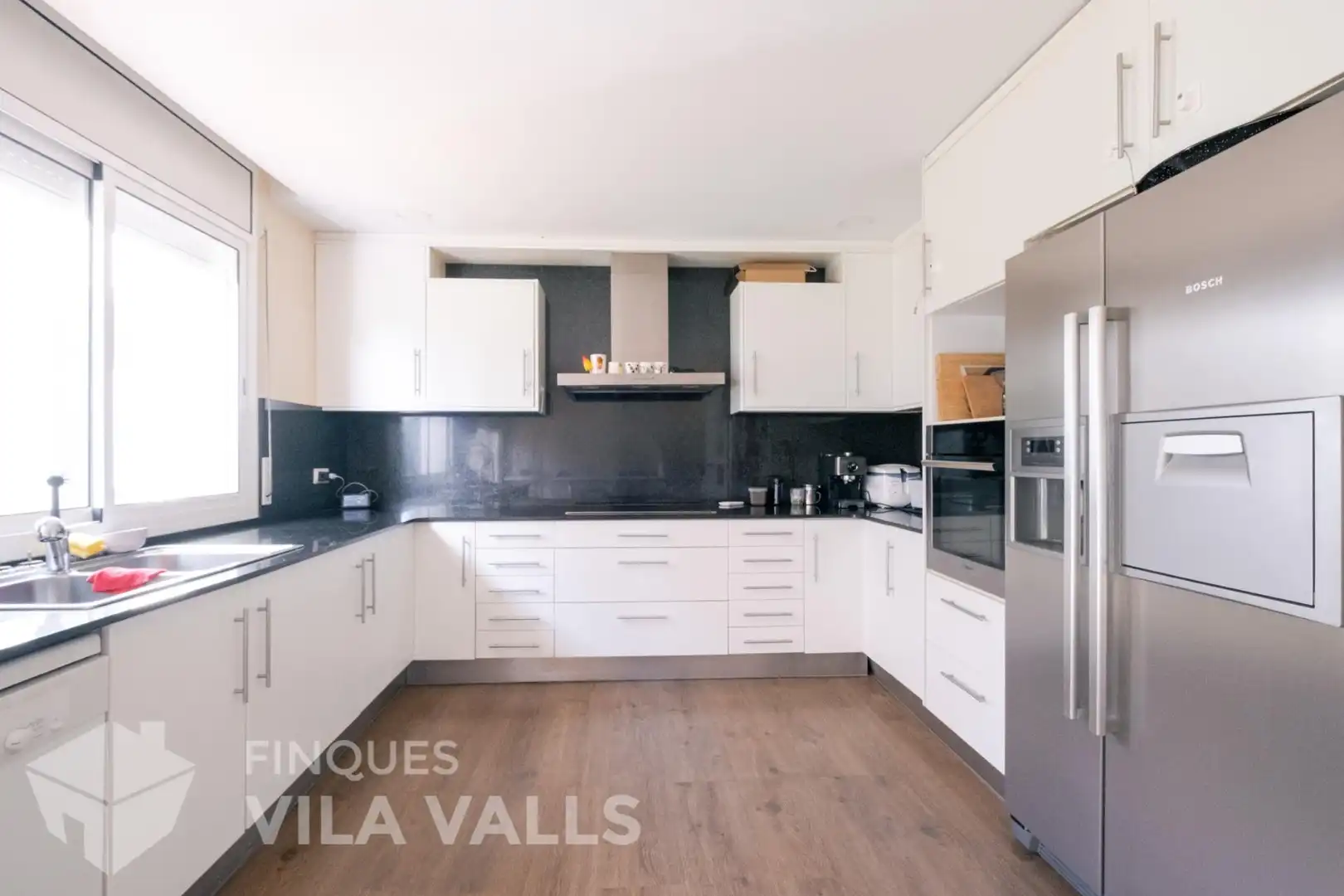 Cuina de Casa o xalet en venda en Bigues i Riells del Fai amb Aire condicionat, Jardí privat i Parquet