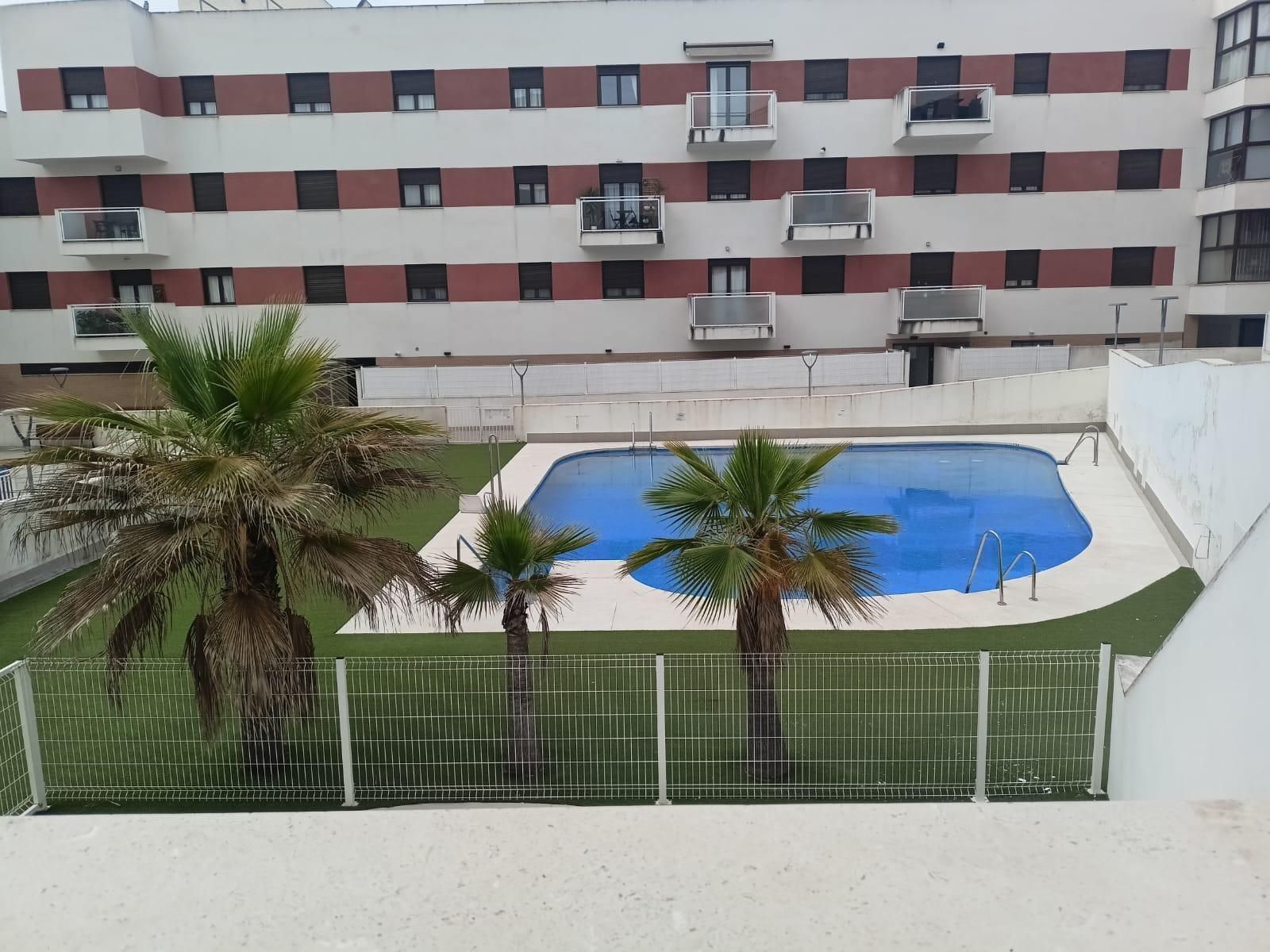 Swimming pool of Flat for sale in Dos Hermanas  with Air Conditioner, Private garden and Terrace