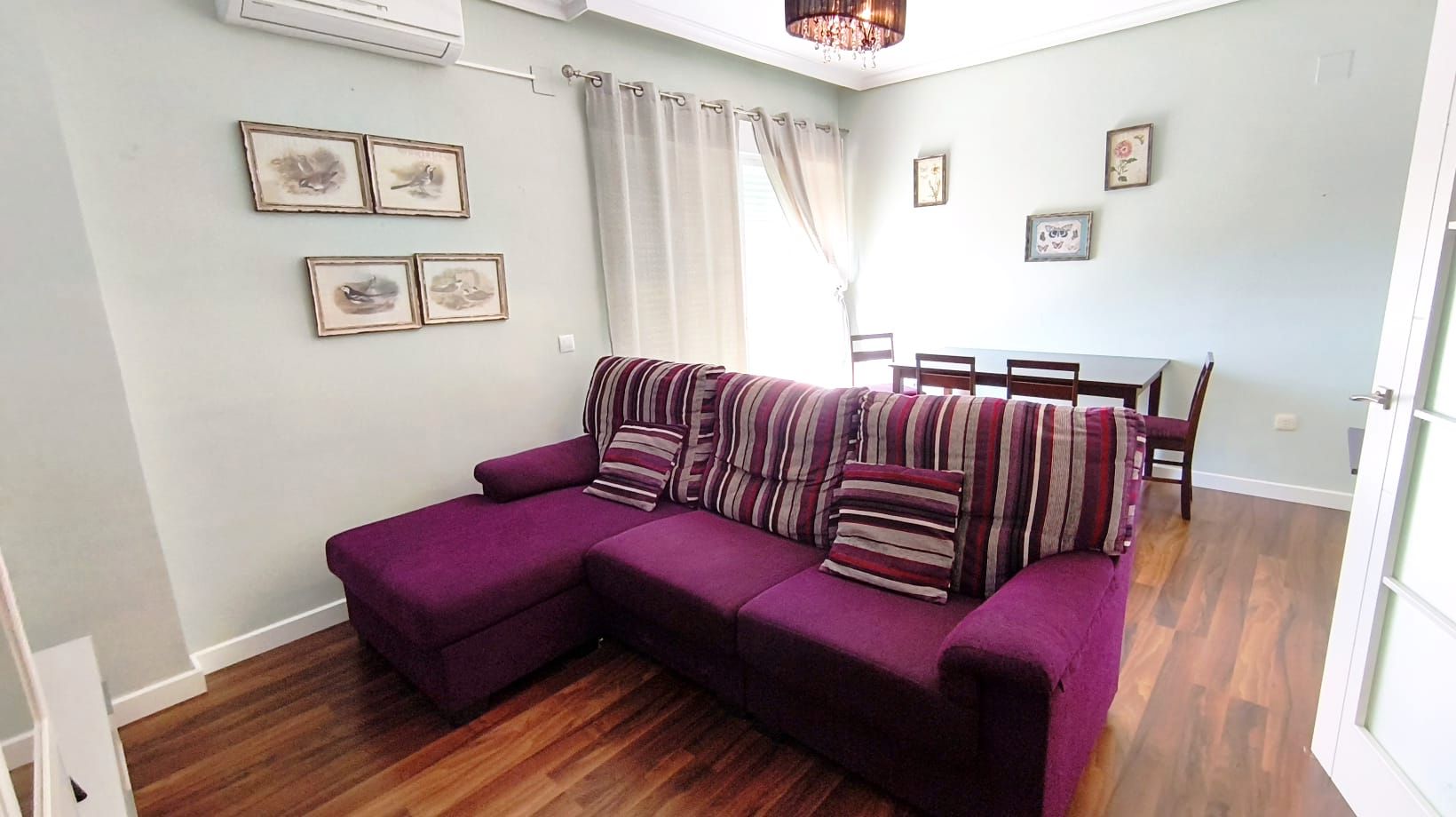 Sala d'estar de Apartament de lloguer en Badajoz Capital amb Aire condicionat, Parquet i Moblat