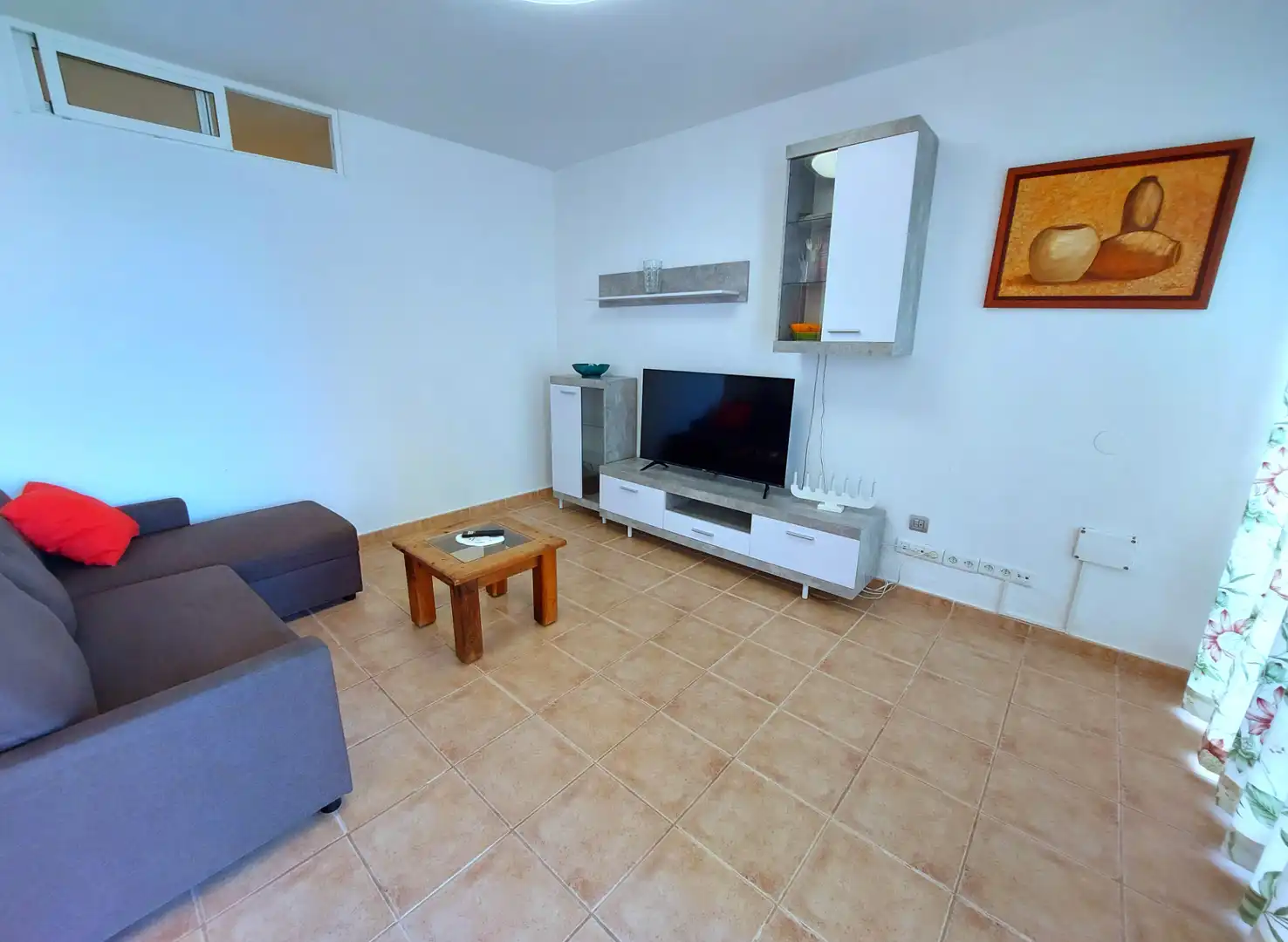 Sala de estar de Apartamento de alquiler en Las Palmas de Gran Canaria con Jardín privado, Terraza y Amueblado