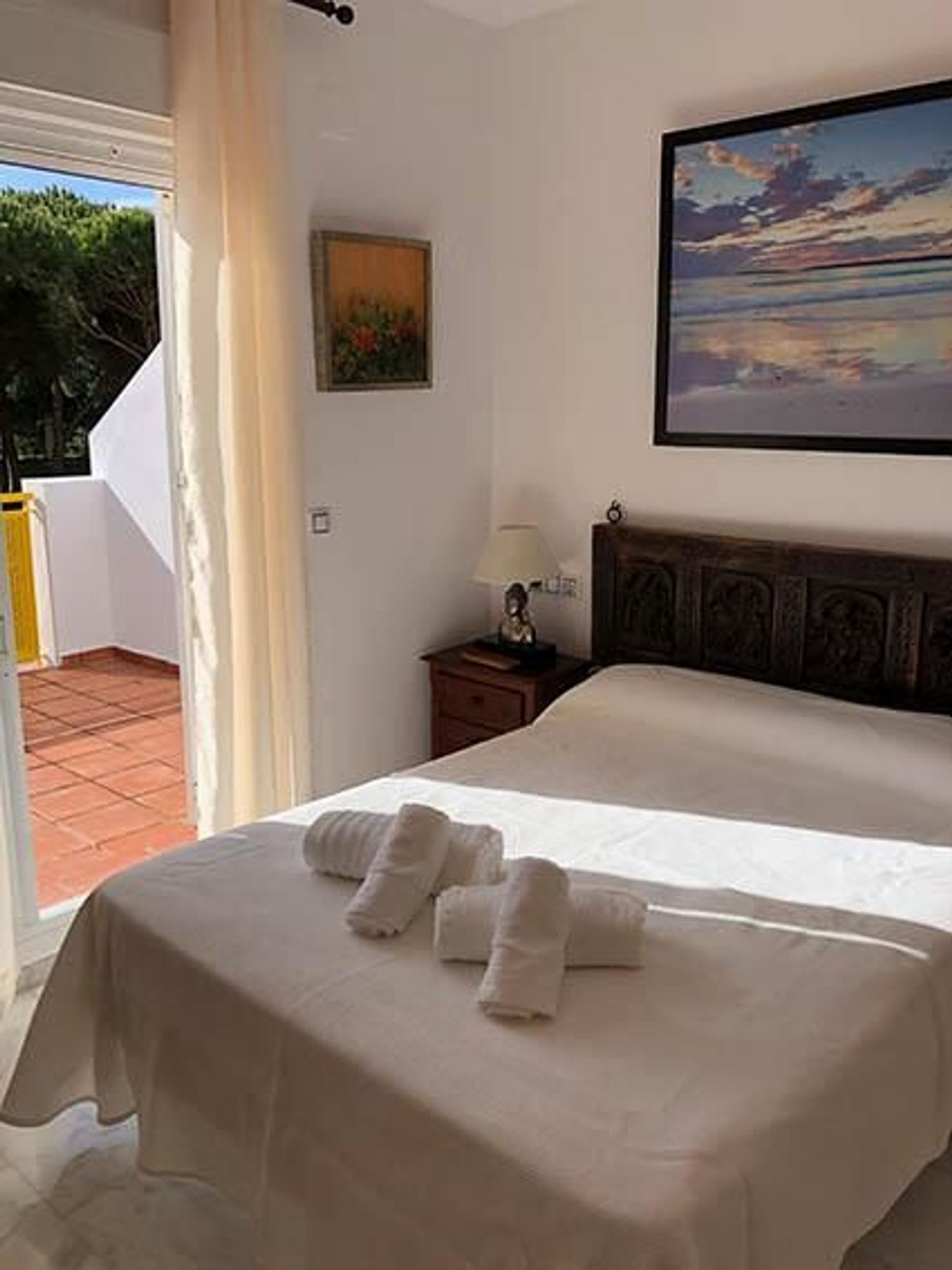 Dormitori de Casa adosada de lloguer en El Portil amb Aire condicionat