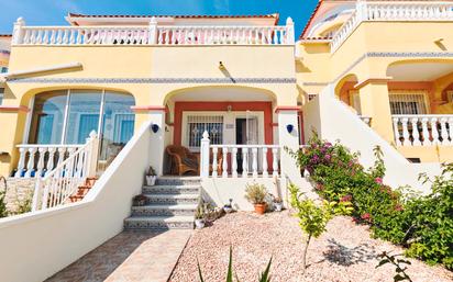 Exterior view of Single-family semi-detached for sale in Pilar de la Horadada  with Air Conditioner