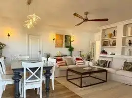 Sala d'estar de Casa o xalet en venda en Punta Umbría amb Aire condicionat, Jardí privat i Parquet