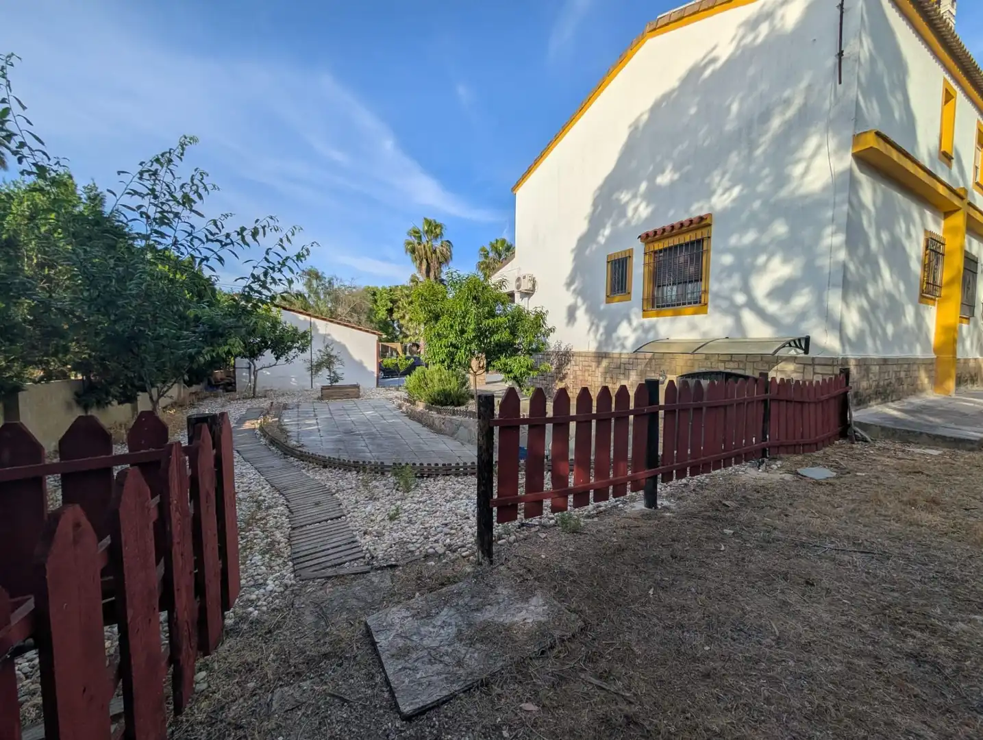 Garden of Houses for sale in Aljaraque  with Air Conditioner and Swimming Pool