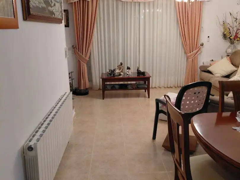 Sala d'estar de Casa adosada en venda en Roda de Berà amb Aire condicionat i Balcó