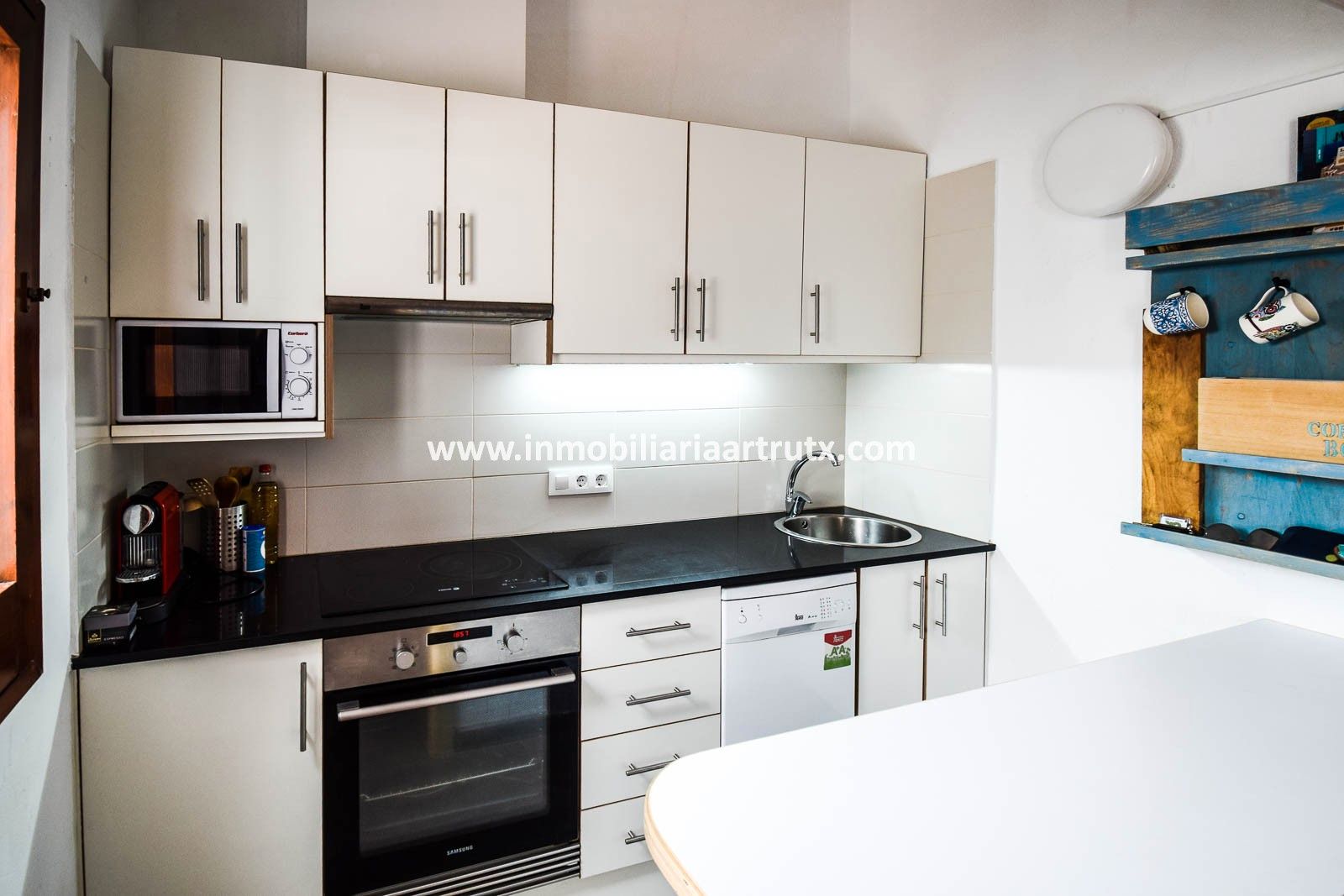 Cuina de Apartament en venda en Ciutadella de Menorca amb Jardí privat, Terrassa i Piscina comunitària