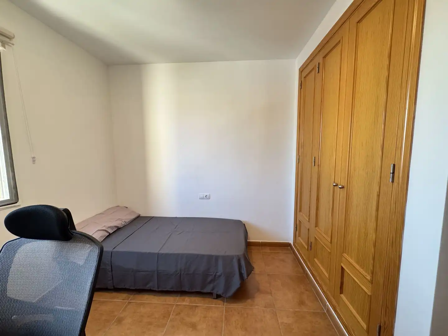 Dormitori de Casa adosada de lloguer en Campos amb Aire condicionat, Calefacció i Jardí privat