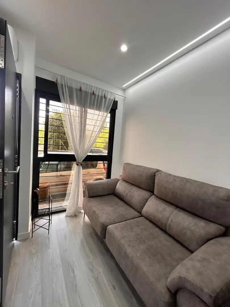 Sala d'estar de Loft de lloguer en Murcia amb Aire condicionat i Moblat