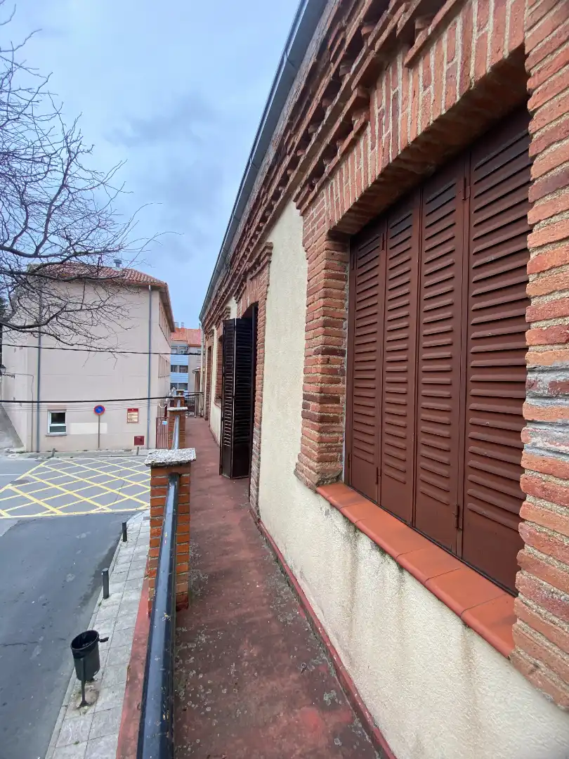 Vista exterior de Casa adosada en venda en San Lorenzo de El Escorial amb Terrassa i Balcó