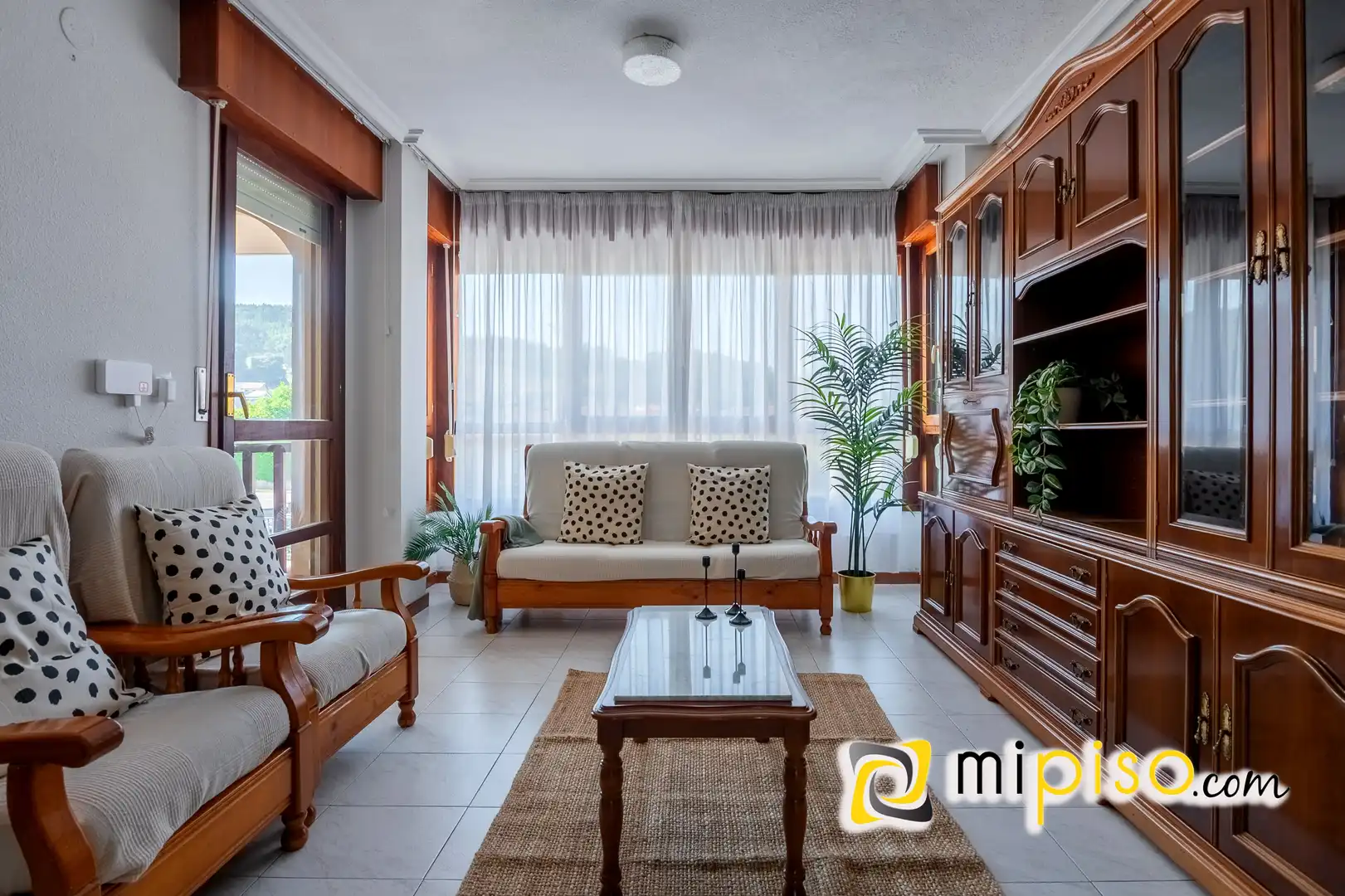 Sala de estar de Piso en venta en Arnuero con Calefacción, Terraza y Amueblado
