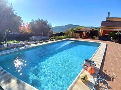 Swimming pool of House or chalet for sale in Torrelles de Foix  with Air Conditioner, Heating and Oven