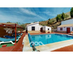 Exterior view of Country house for sale in El Borge  with Air Conditioner, Terrace and Swimming Pool