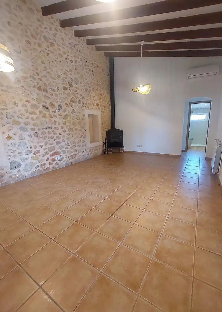 Sala de estar de Finca rústica de alquiler en Alaró con Aire acondicionado, Jardín privado y Terraza