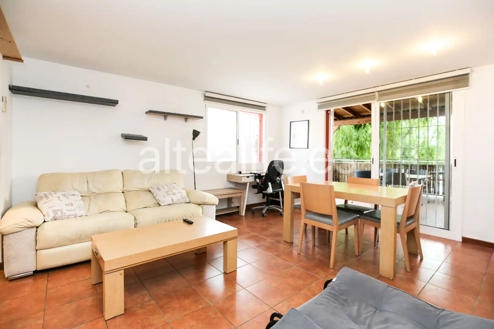 Sala de estar de Casa adosada en venta en La Nucia con Aire acondicionado, Jardín privado y Terraza