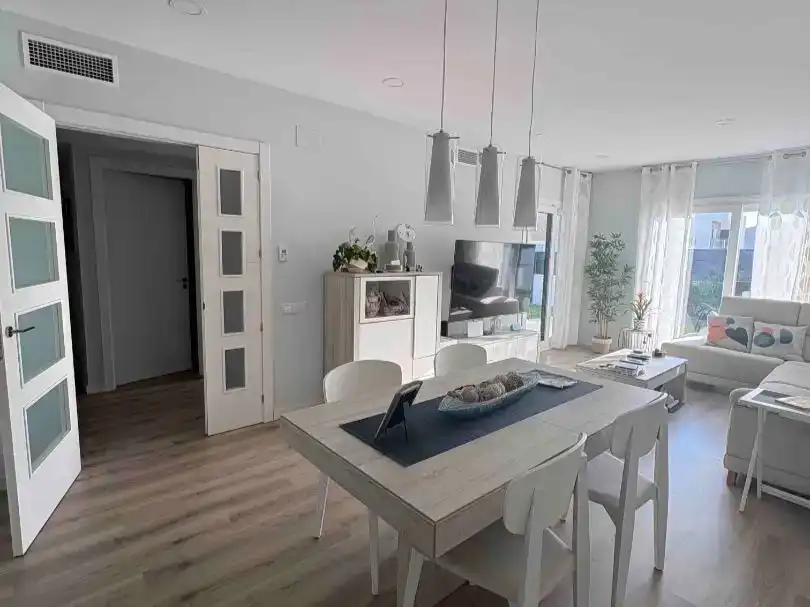 Dining room of Flat for sale in Cunit  with Air Conditioner, Private garden and Parquet flooring