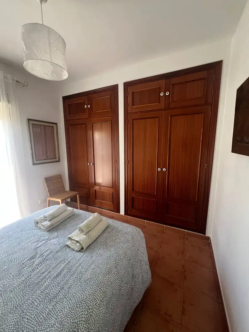 Habitación de Casa adosada en venta en Islantilla con Jardín privado, Trastero y Piscina comunitaria