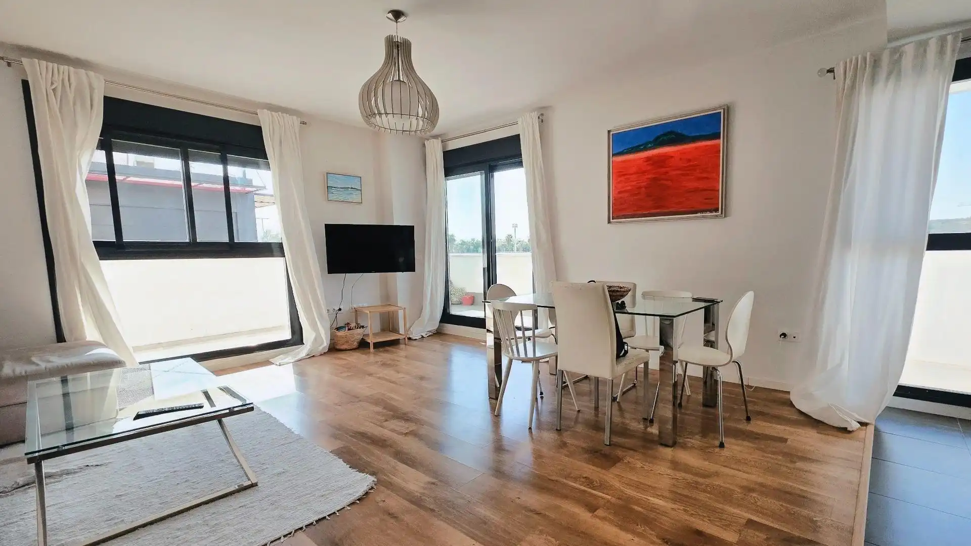 Sala d'estar de Pis en venda en San Juan de Aznalfarache amb Aire condicionat, Jardí privat i Parquet