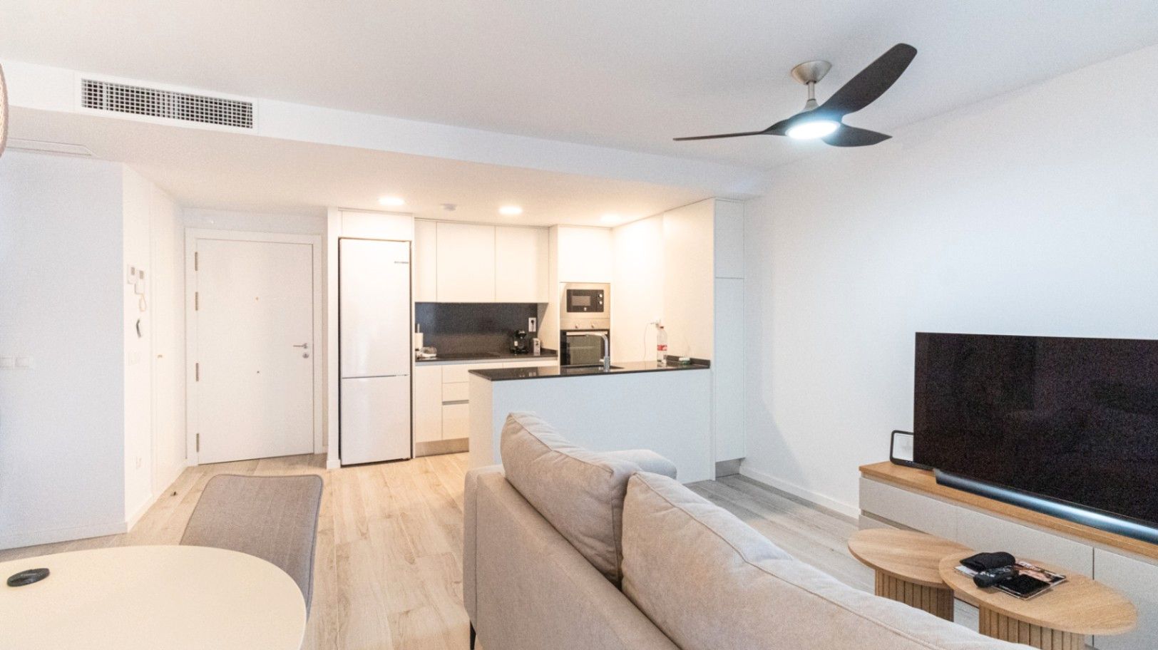 Sala d'estar de Apartament en venda en Dénia amb Aire condicionat, Calefacció i Jardí privat