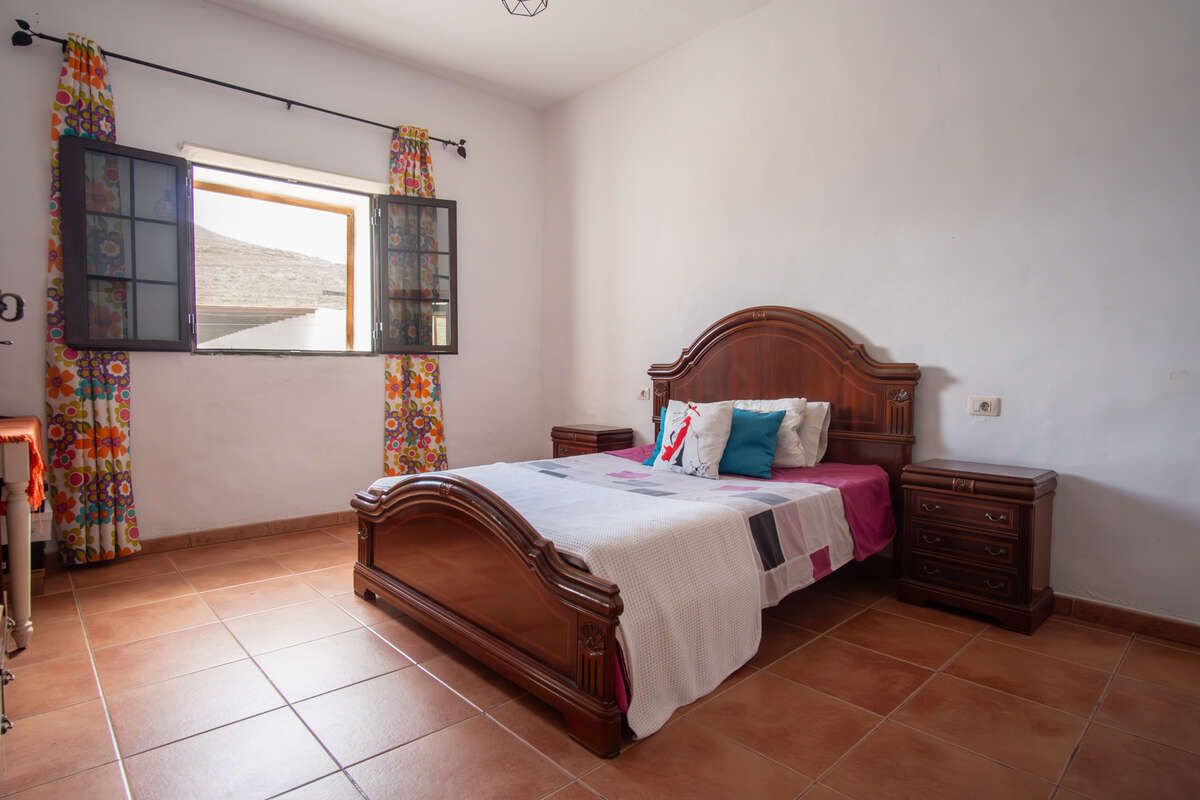 Dormitori de Casa o xalet en venda en Haría amb Jardí privat, Terrassa i Traster