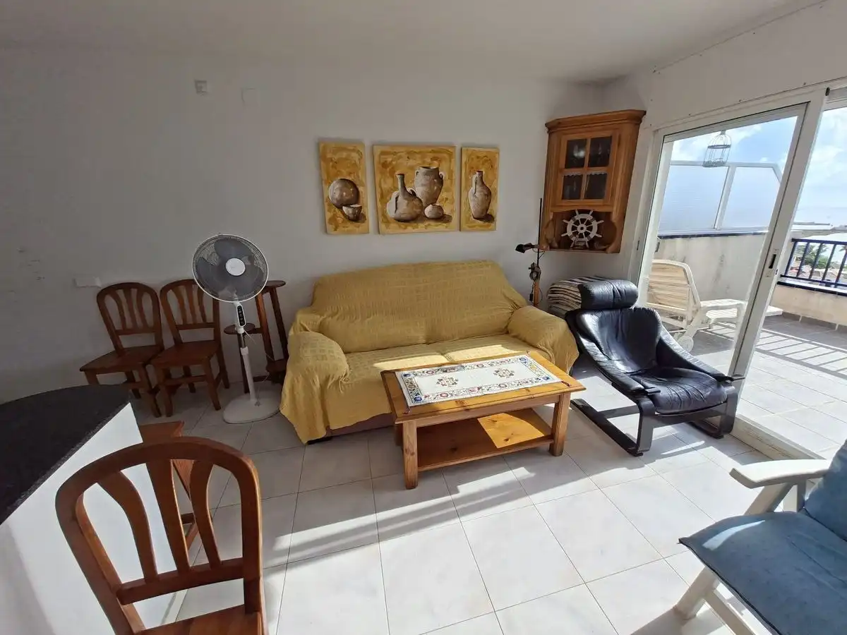 Sala d'estar de Àtic en venda en La Ràpita amb Piscina comunitària