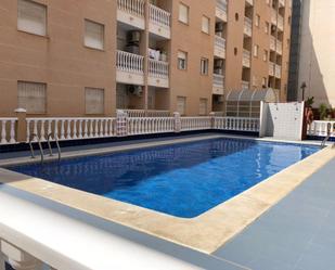 Swimming pool of Apartment for sale in Torrevieja  with Air Conditioner, Terrace and Balcony