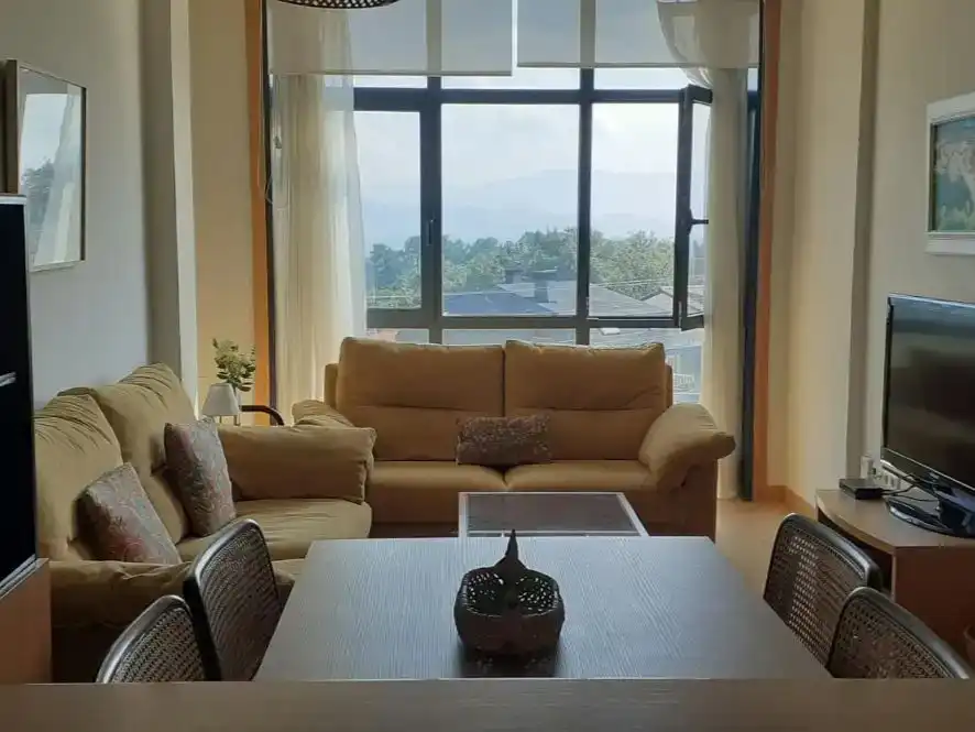 Wohnzimmer von Wohnungen zur Miete in Nigrán mit Schwimmbad
