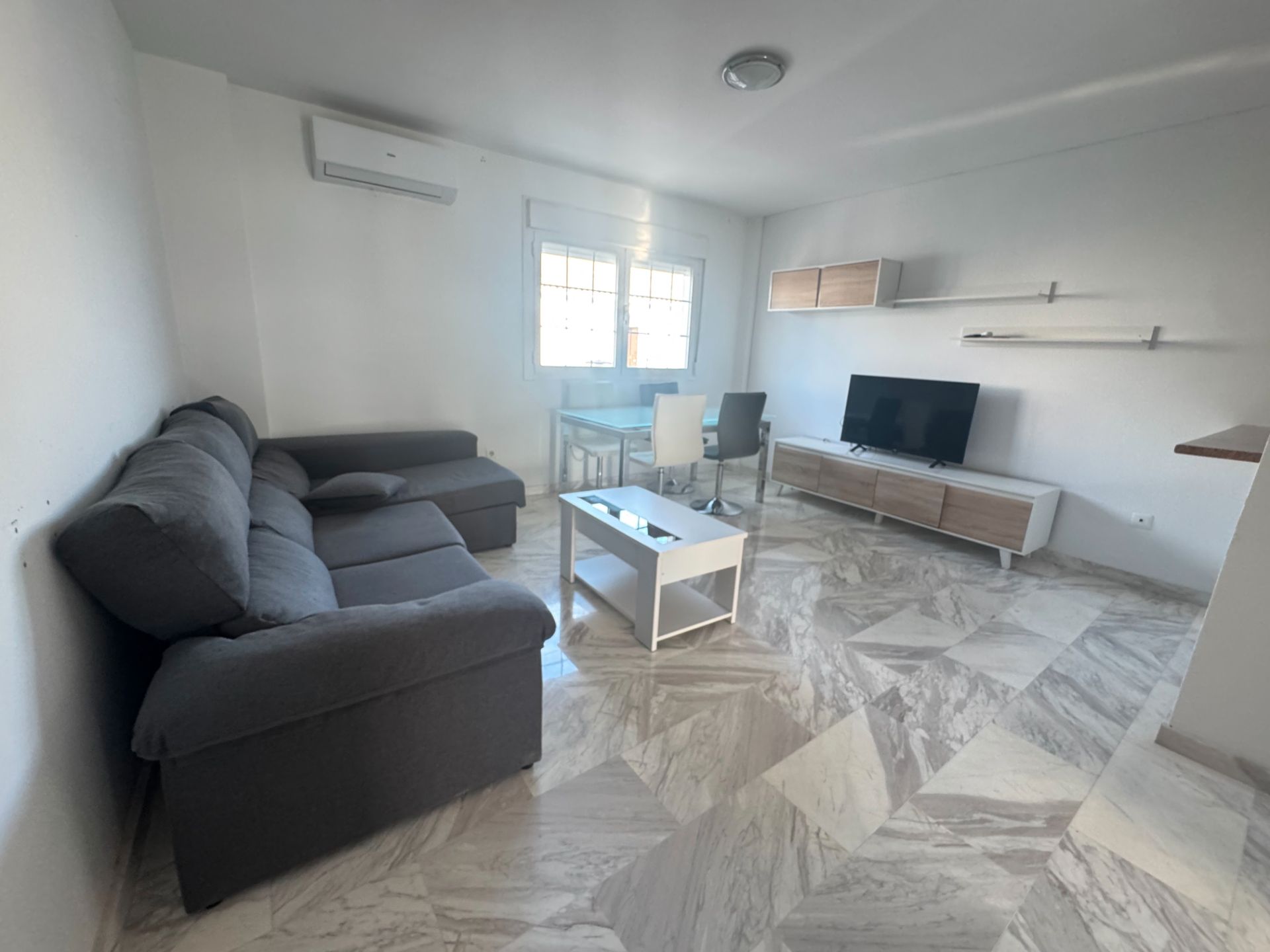 Sala d'estar de Apartament en venda en Albolote amb Aire condicionat, Moblat i Forn
