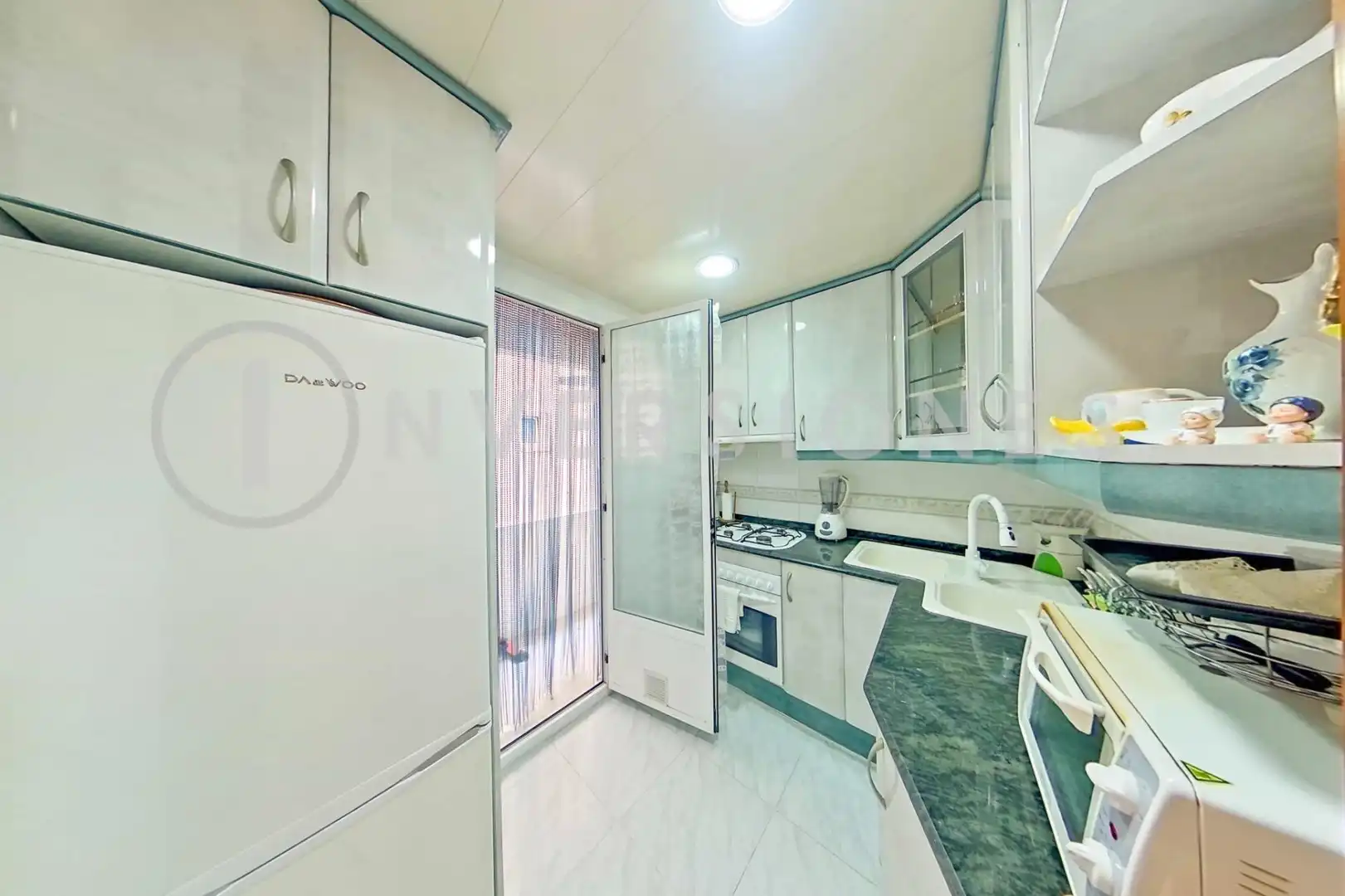 Kitchen of Flat for sale in Sabadell  with Air Conditioner and Balcony