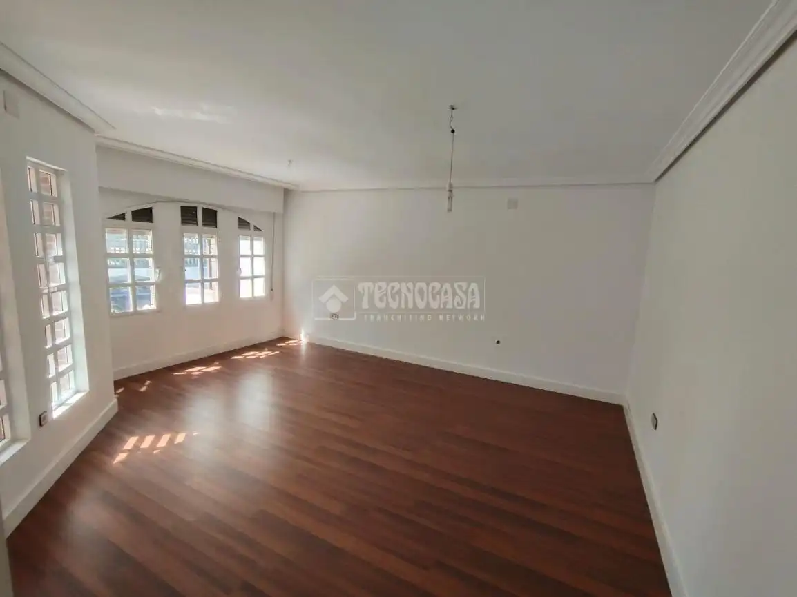 Sala d'estar de Casa adosada en venda en Mengíbar amb Piscina