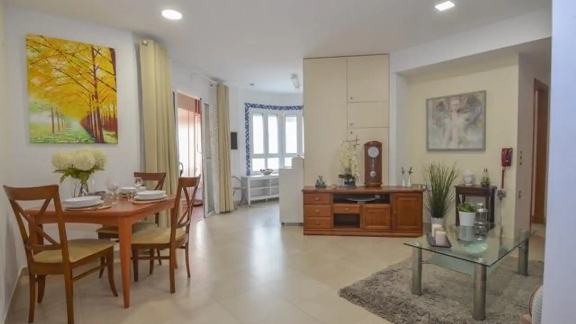 Sala d'estar de Apartament en venda en Benalmádena amb Aire condicionat, Jardí privat i Terrassa