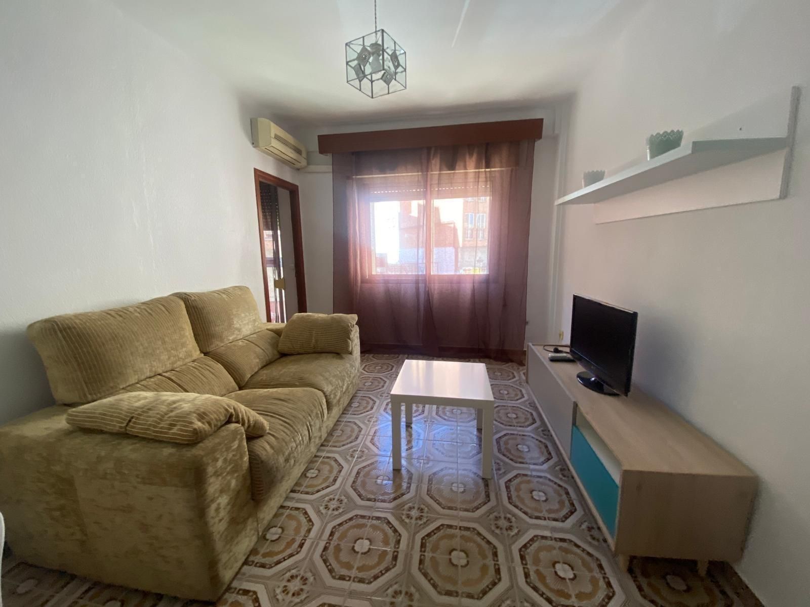 Sala d'estar de Pis de lloguer en Cáceres Capital amb Aire condicionat i Balcó