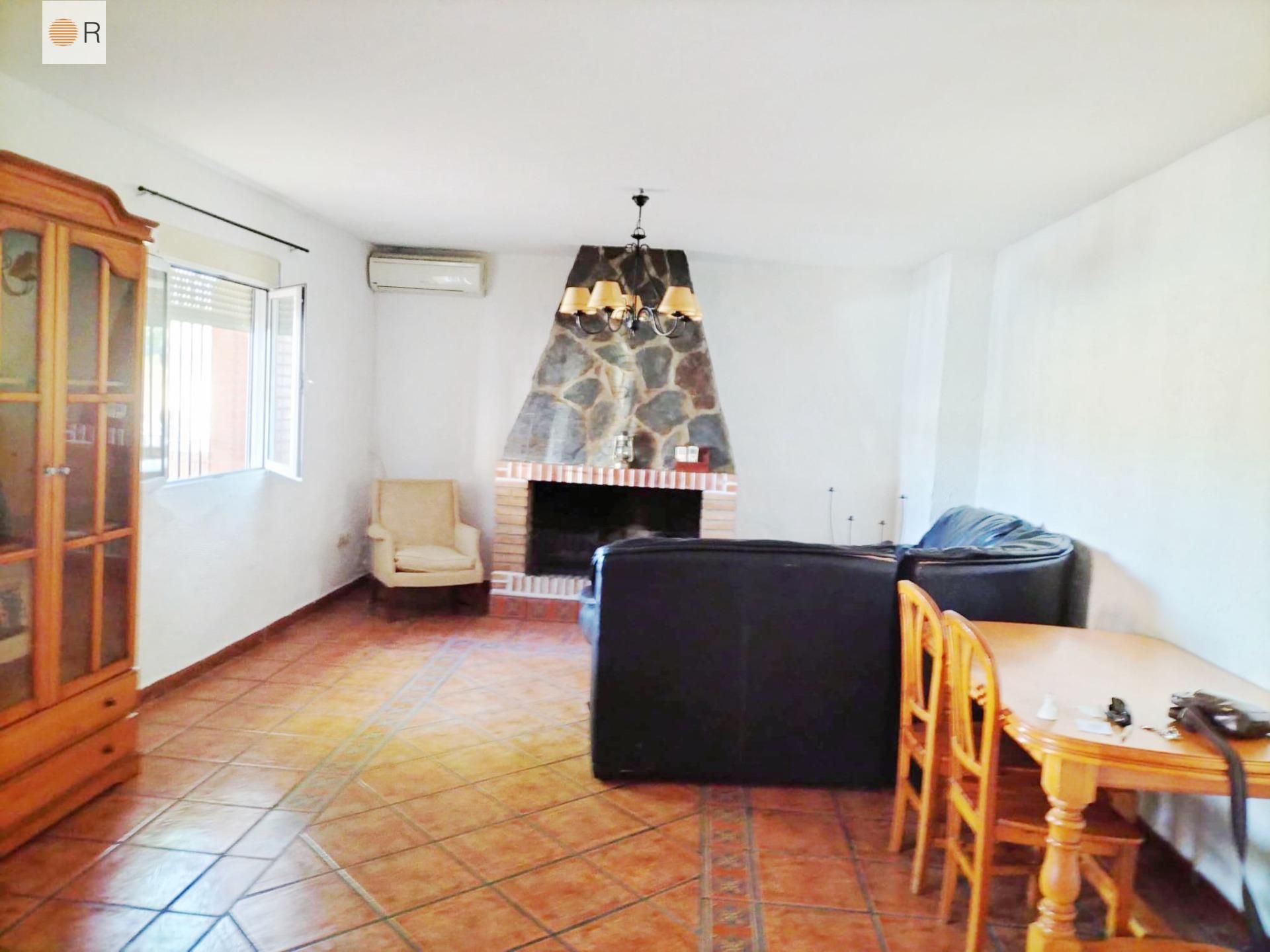 Sala d'estar de Casa o xalet en venda en Obejo amb Aire condicionat i Moblat