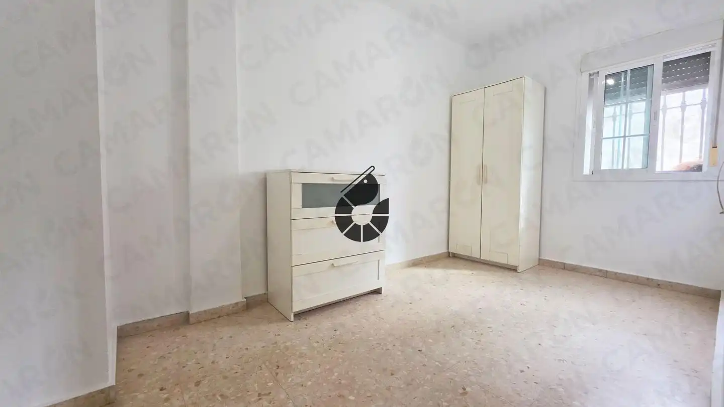 Habitación de Casa adosada en venta en Coria del Río con Aire acondicionado