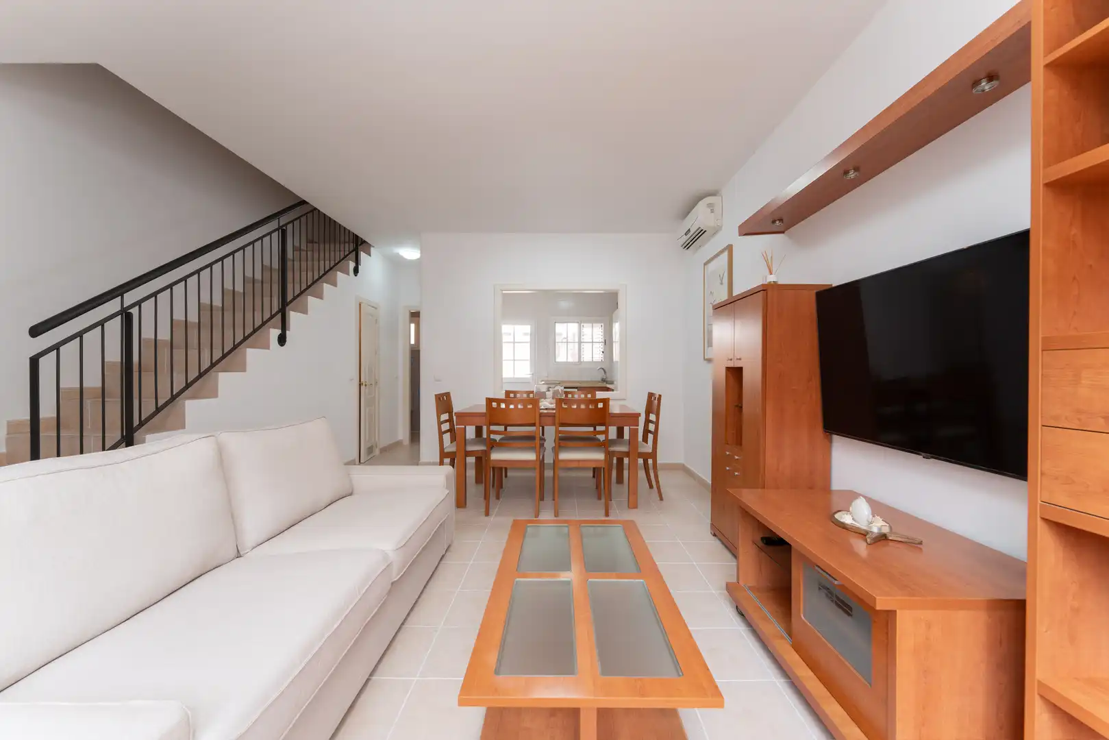 Sala de estar de Casa adosada en venta en San Bartolomé de Tirajana con Aire acondicionado, Jardín privado y Terraza
