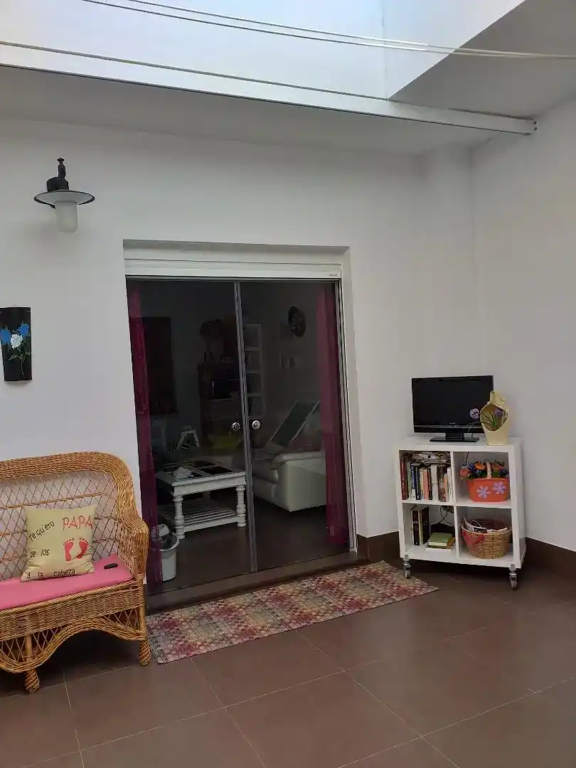 Sala d'estar de Casa adosada en venda en Aguadulce (Sevilla) amb Aire condicionat, Parquet i Traster