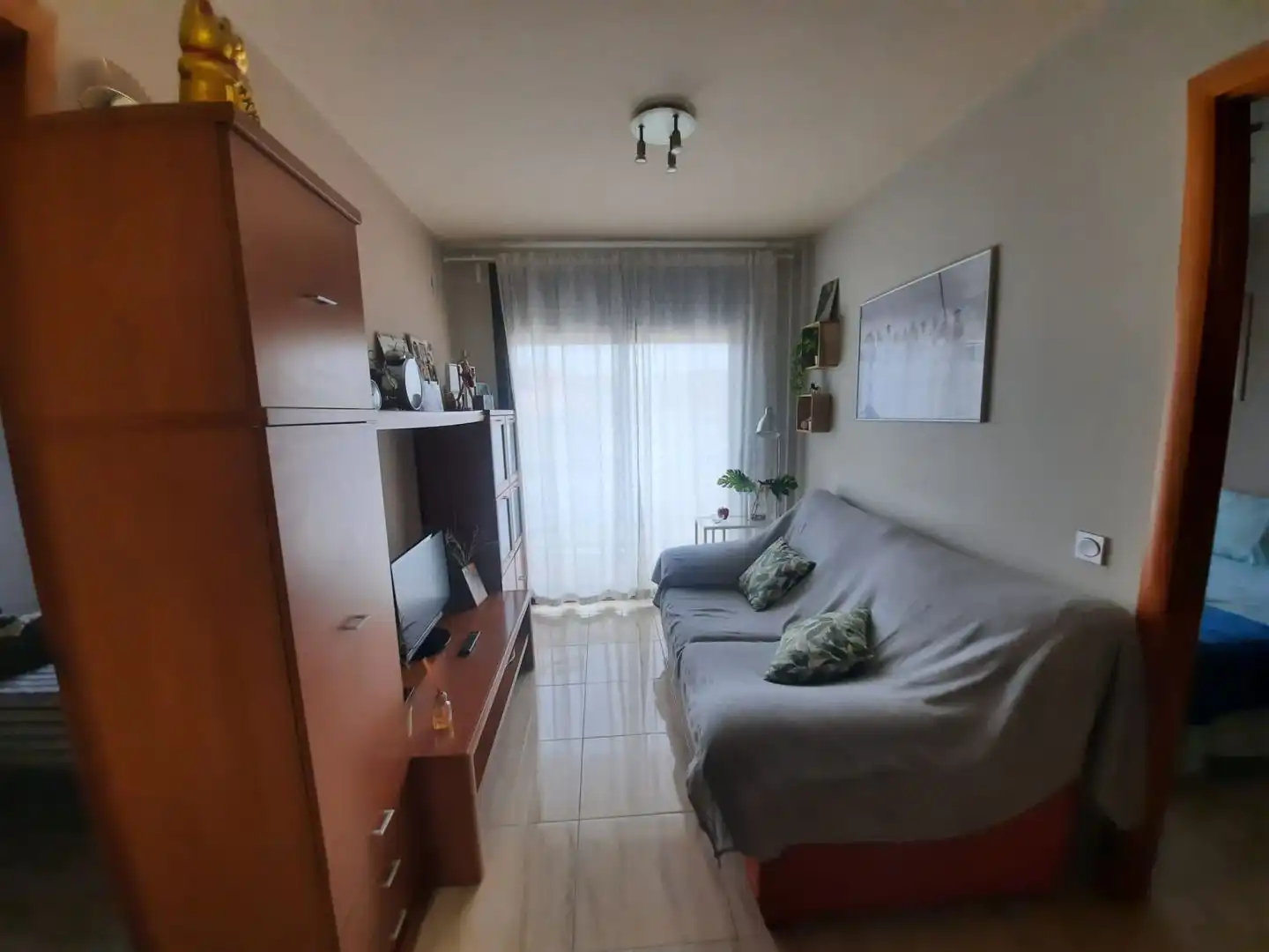 Wohnzimmer von Dachboden zum Verkauf in Reus mit Terrasse, Möbliert und Ofen