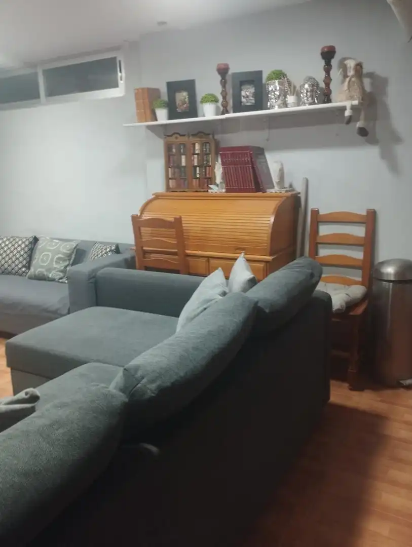 Sala d'estar de Casa adosada en venda en Casco Urbano