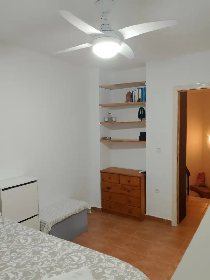 Dormitori de Casa adosada en venda en Vélez-Málaga amb Terrassa, Traster i Piscina comunitària