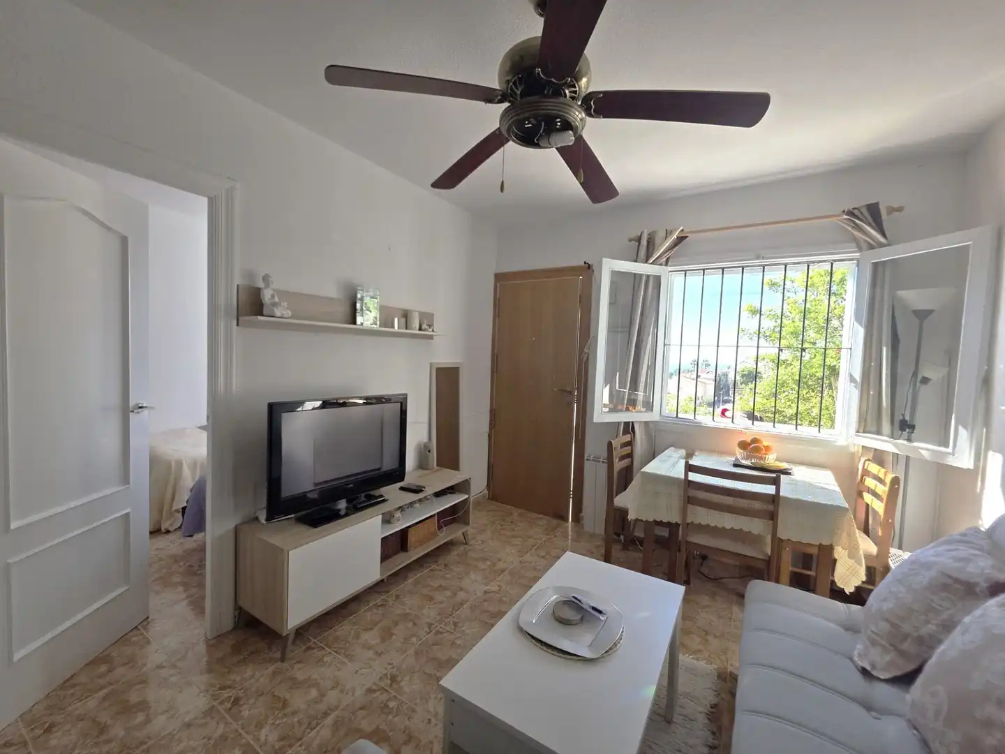Sala d'estar de Casa adosada en venda en Santa Pola amb Aire condicionat, Calefacció i Jardí privat