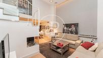 Living room of Flat for sale in  Madrid Capital  with Air Conditioner, Heating and Private garden