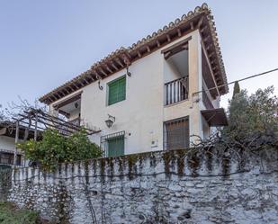 Exterior view of House or chalet for sale in  Granada Capital  with Private garden and Terrace