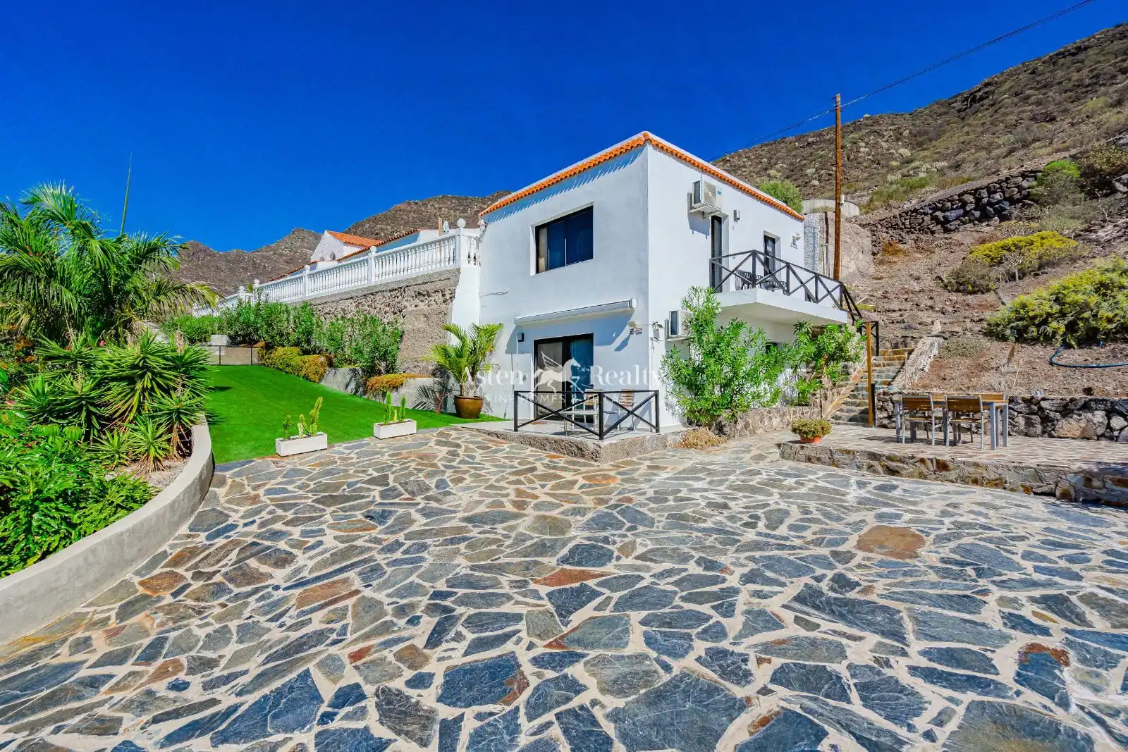 Vista exterior de Casa o chalet en venta en Santiago del Teide con Aire acondicionado, Terraza y Piscina