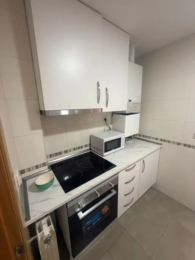 Cuina de Pis de lloguer en Puertollano amb Aire condicionat, Calefacció i Moblat