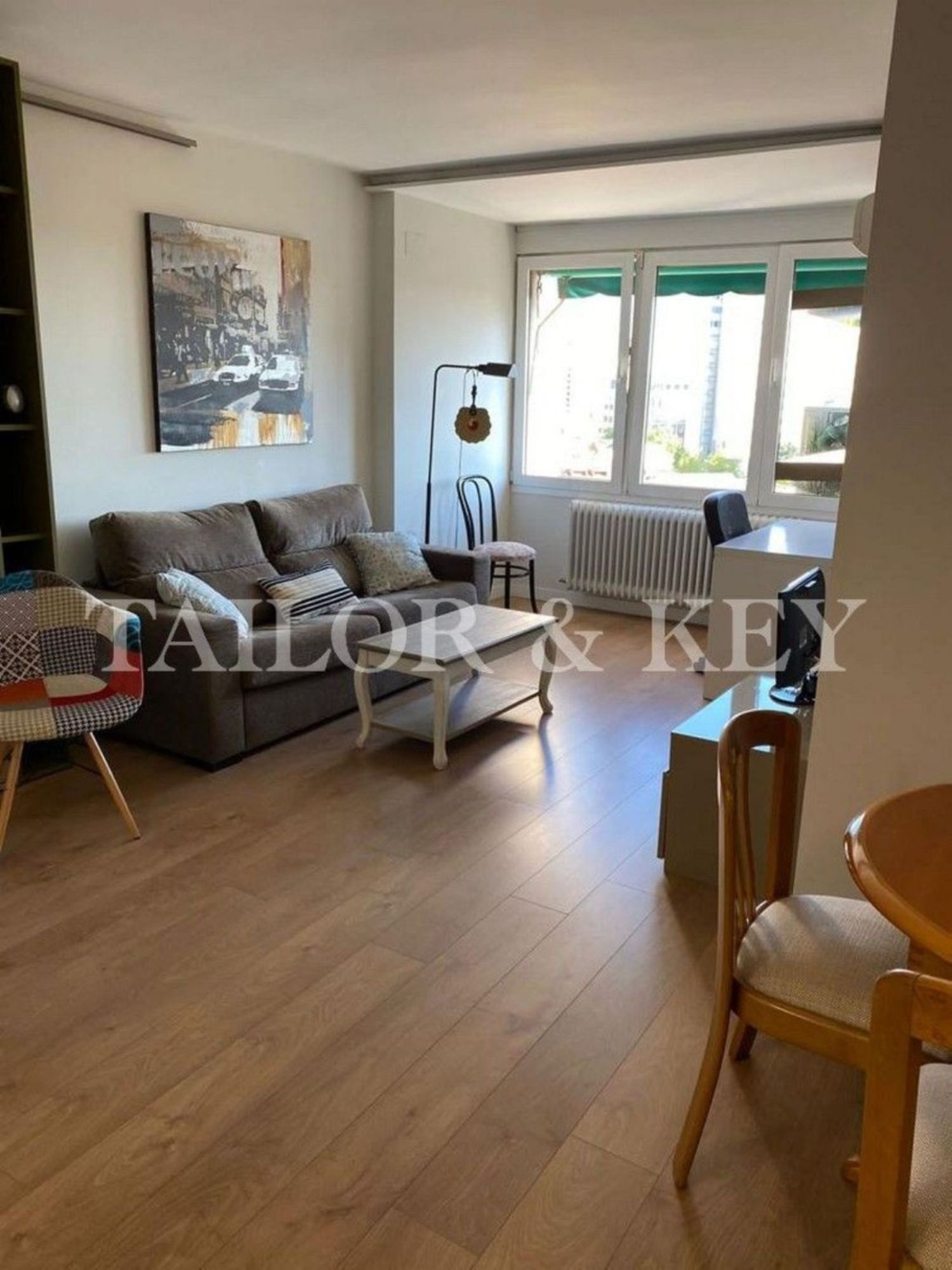 Sala d'estar de Àtic de lloguer en  Madrid Capital amb Aire condicionat i Moblat