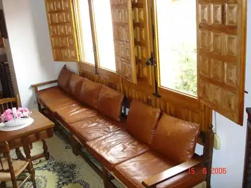 Sala d'estar de Casa o xalet en venda en El Cuervo amb Calefacció, Parquet i Moblat